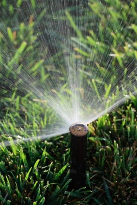 Lawn sprinkler service in Smith Village, OK by Apple Valley Eco Landscapes.
